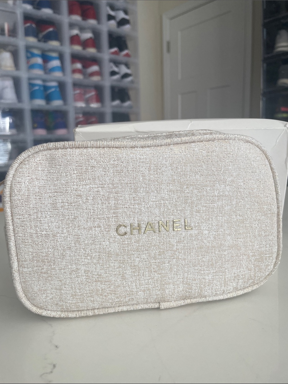 CHANEL Cream Textured Fabric Case with Gold Logo
